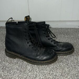 standard black doc martens, lace up 8 hole. US 5